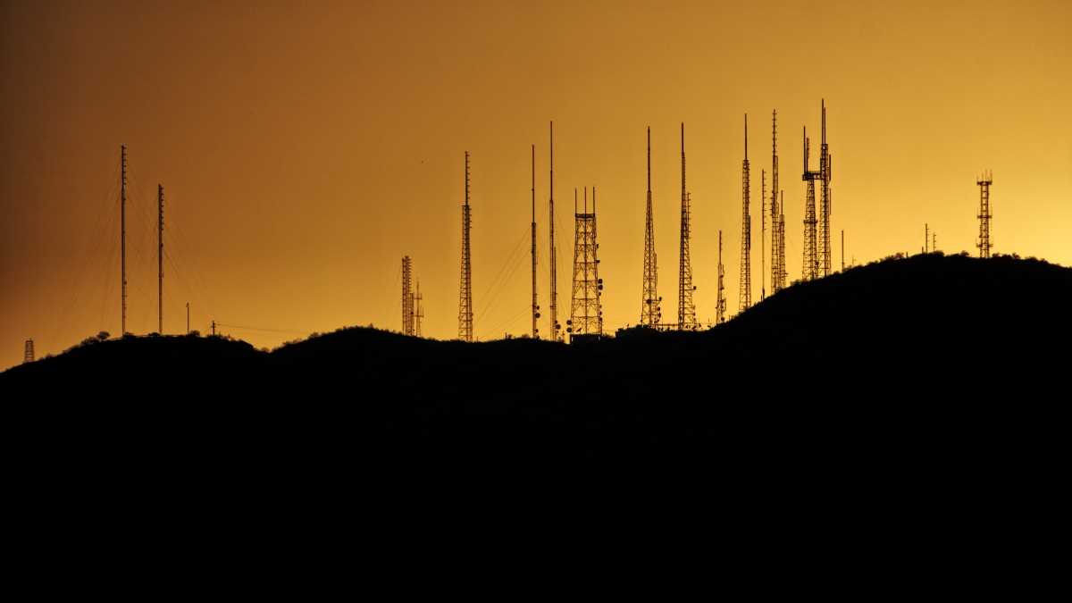 https://www.pexels.com/photo/silhouette-photo-of-transmission-tower-on-hill-2525871/